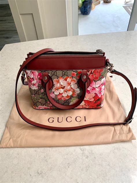 gucci pouch bloom|real gucci pouch.